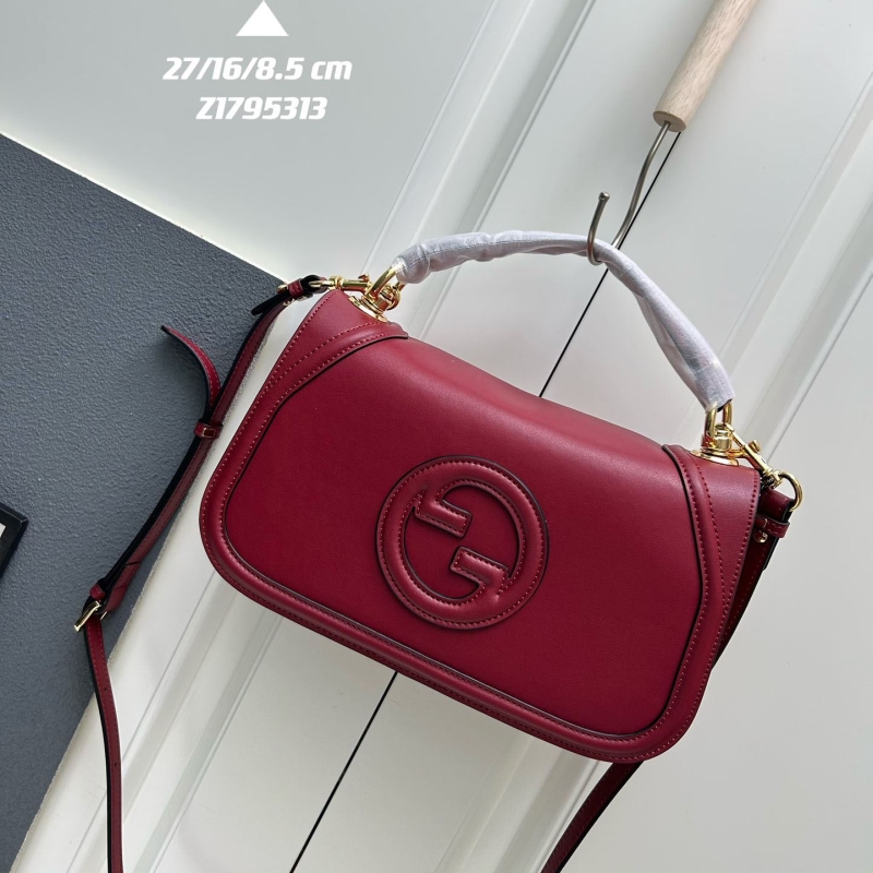 G*u*i top handle bags